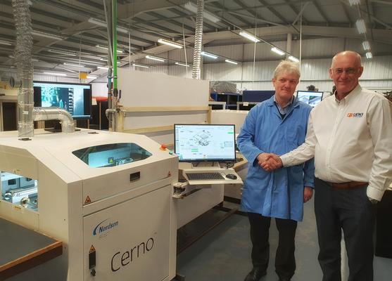 John Robertson MD & Graham Dickson shaking hands after a successful installation